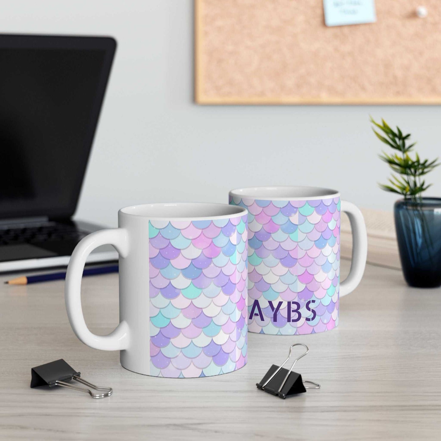 Vibrant Shell Ceramic Mug with colorful pastel scale pattern on glossy finish, ideal for coffee or tea, microwave and dishwasher safe.