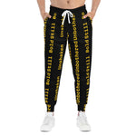 Eco-friendly black joggers with bold yellow 