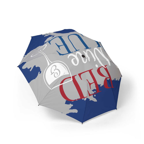 Foldable umbrella with blue and gray canopy featuring bold red and white text design, compact and travel-friendly rain gear