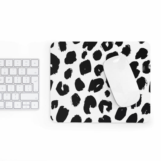 Chic leopard print mouse pad with black and white design beside white keyboard and mouse