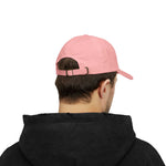 man wearing pink classic cap with adjustable antique brass buckle closure viewed from back