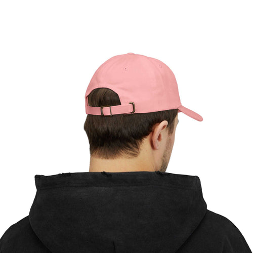 man wearing pink classic cap with adjustable antique brass buckle closure viewed from back
