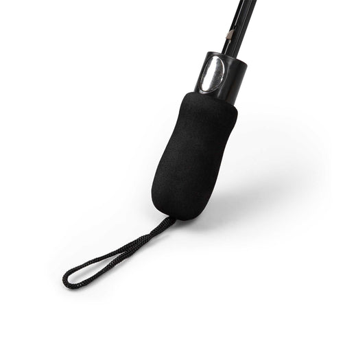 Foldable umbrella with black rubber handle and wrist strap on white background