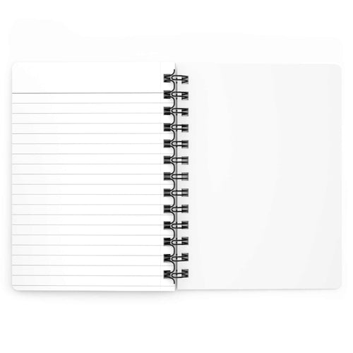 Open autumn-inspired spiral bound journal showing lined and blank pages for writing and sketching