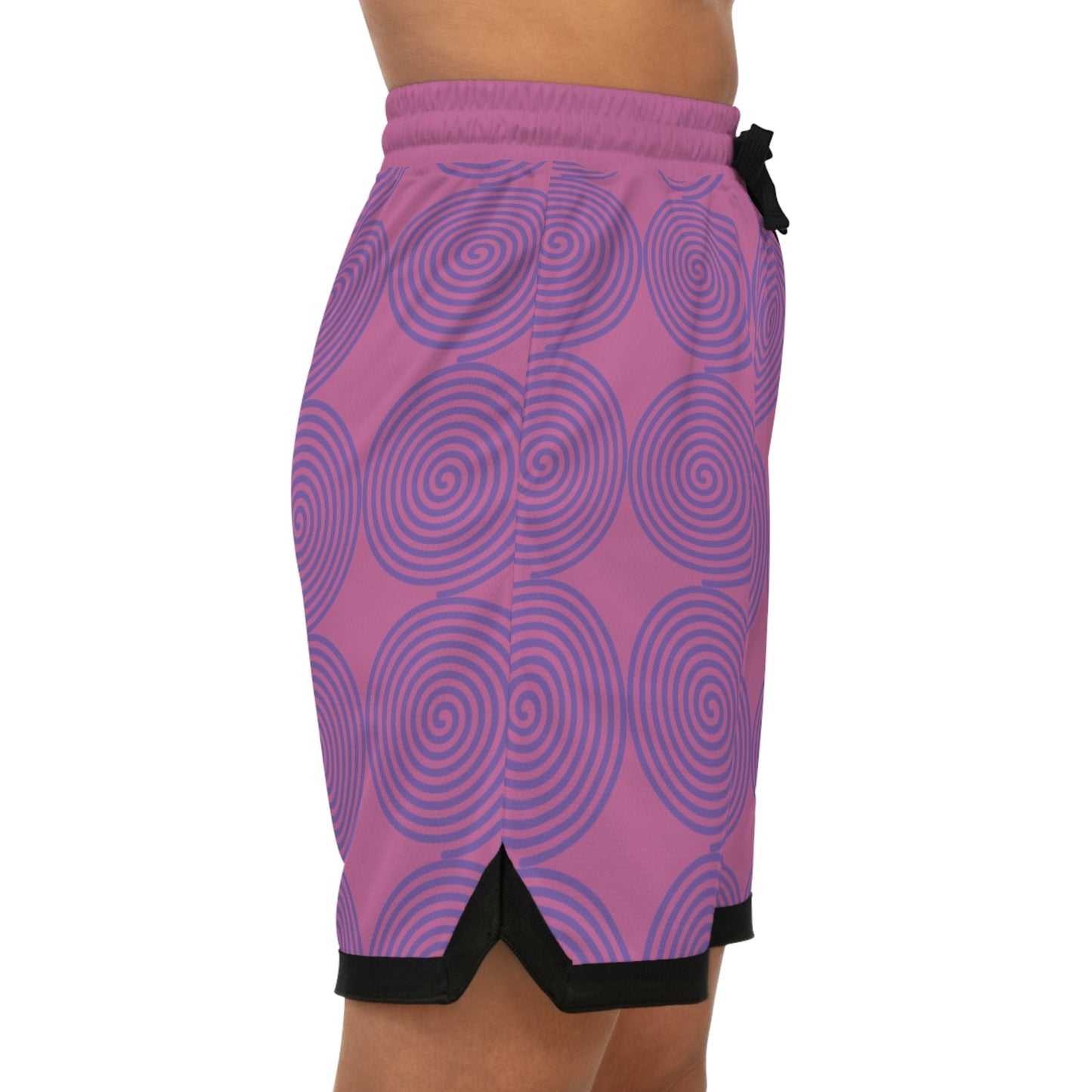 Women's basketball rib shorts with purple spiral design and black detailing, made of moisture-wicking polyester