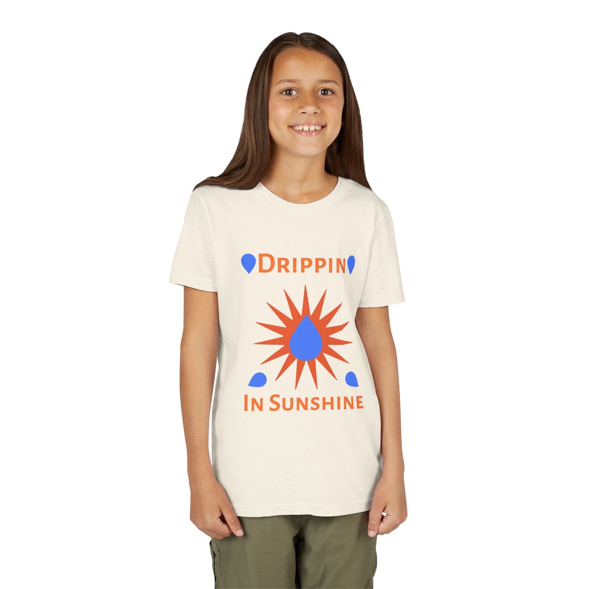 Child wearing white youth short sleeve tee with orange and blue "Drippin In Sunshine" graphic design
